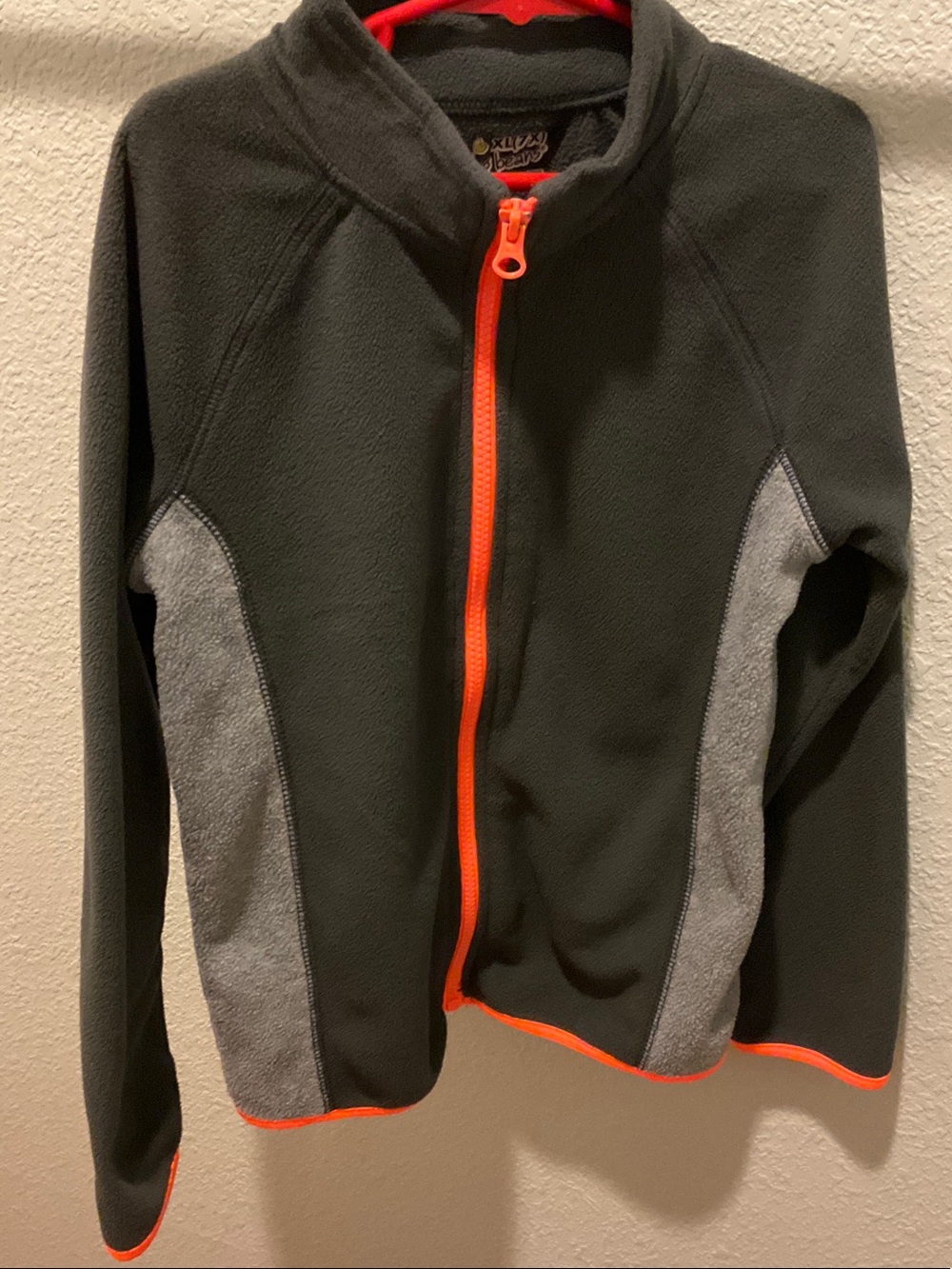 Grey Fleece Jacket with Panels and Orange Trim, size 7